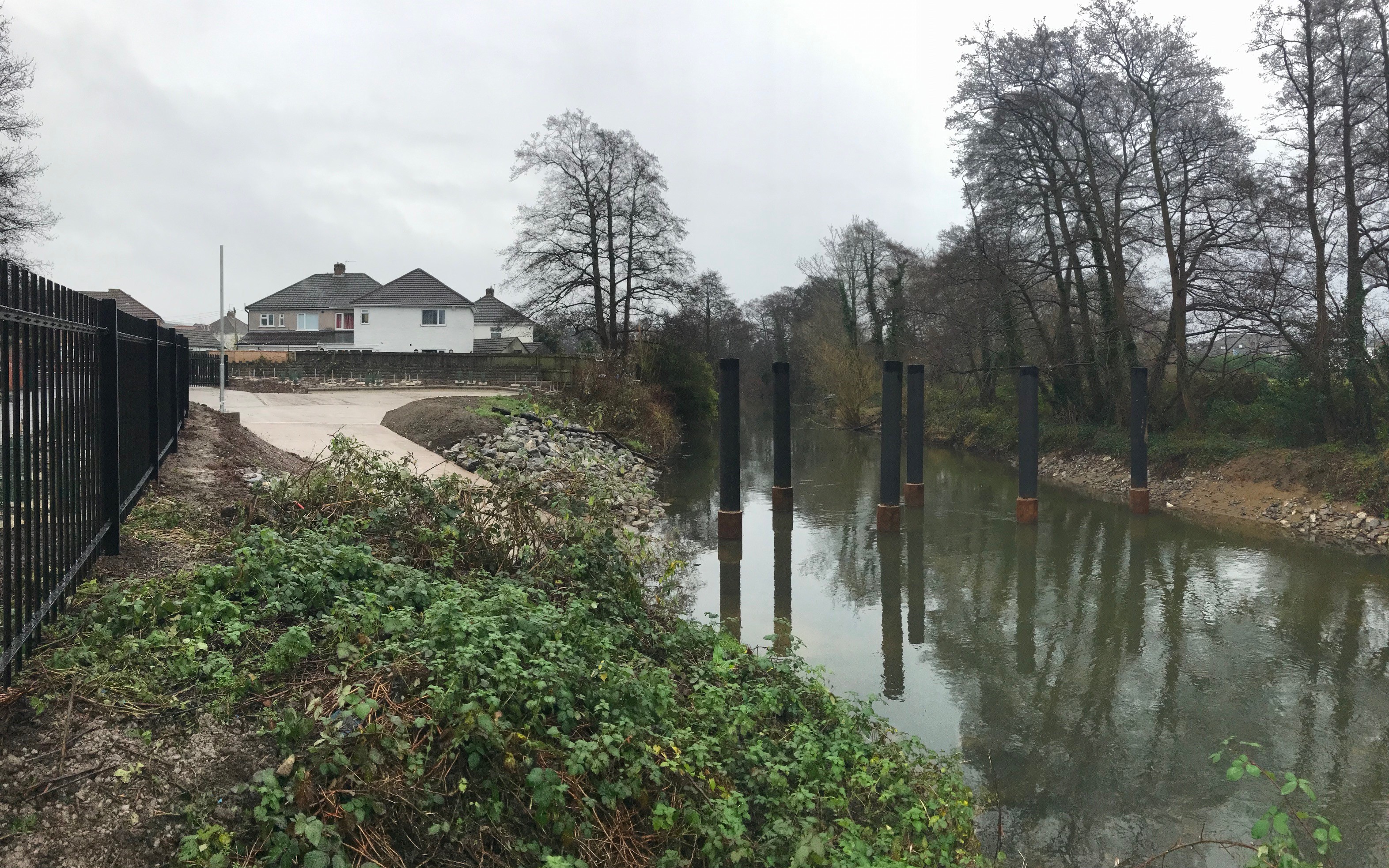 Tree catcher poles across the River Ely in Cardiff